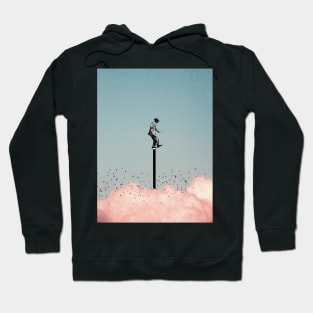 Balancing on one leg above the clouds Hoodie